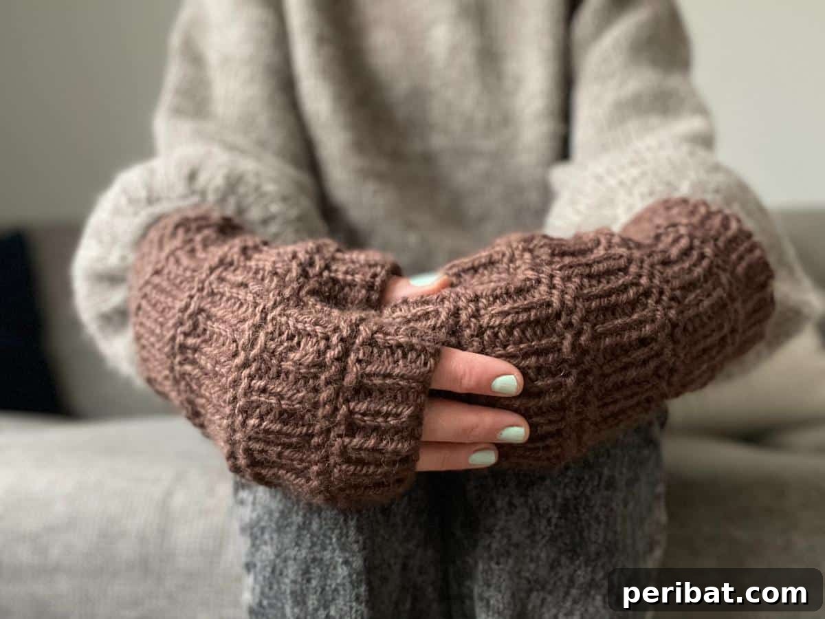 18 Timeless Aran Knitting Patterns 9 Stockholm Gloves, a pattern for practical fingerless gloves.