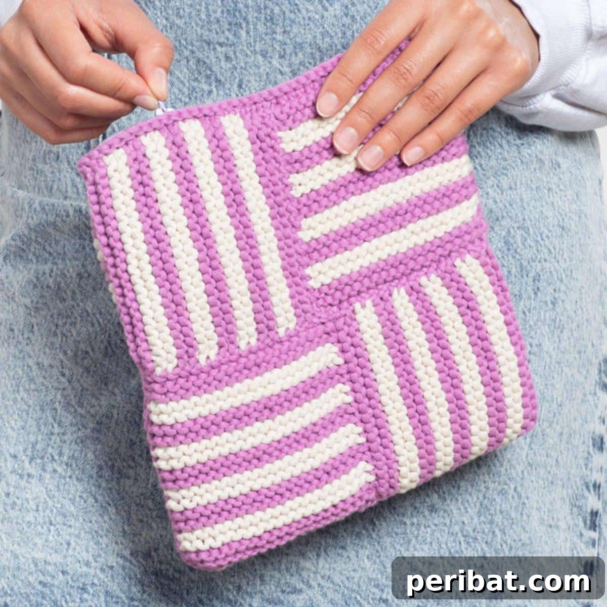 18 Timeless Aran Knitting Patterns 10 Zippered Pouch, a practical knit accessory for organization.
