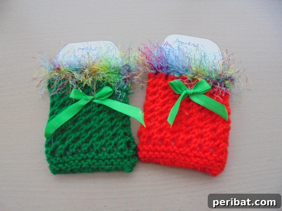 18 Creative Double Knitting Designs 11 Festive Phone Cosies. Simple, delightful project for a snug, festive phone accessory with eyelash yarn and ribbon bow.