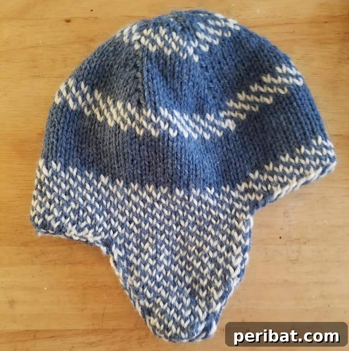 18 Creative Double Knitting Designs 13 Yooper Hat. Double-knitted, reversible hat with earflaps for extra warmth and two looks in one versatile winter accessory.