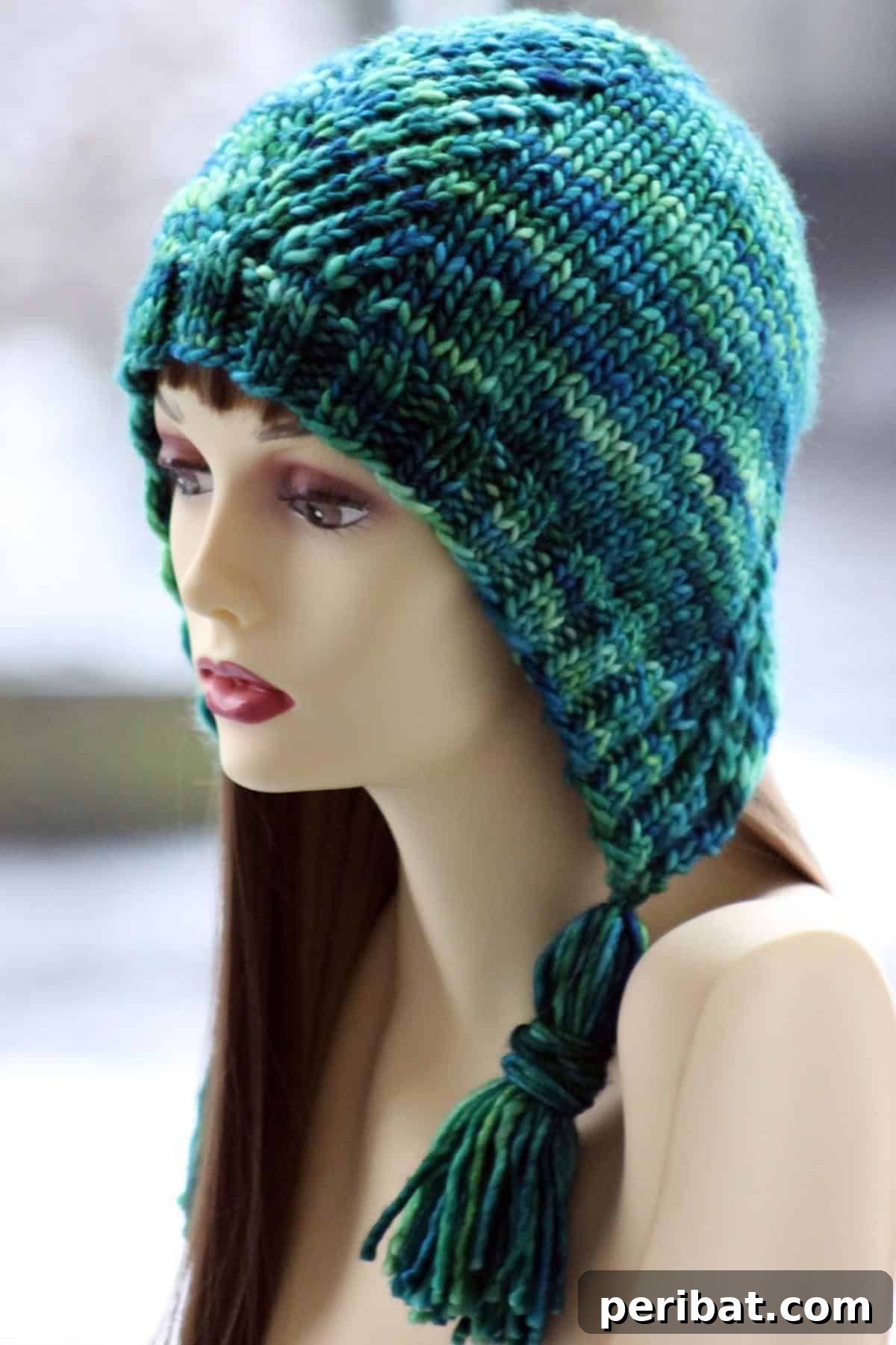 32 Cozy Ear Flap Hat Knitting Designs 20 A vintage-inspired Betty Bonnet knitting pattern, featuring twisted stitches and cozy ribbing.