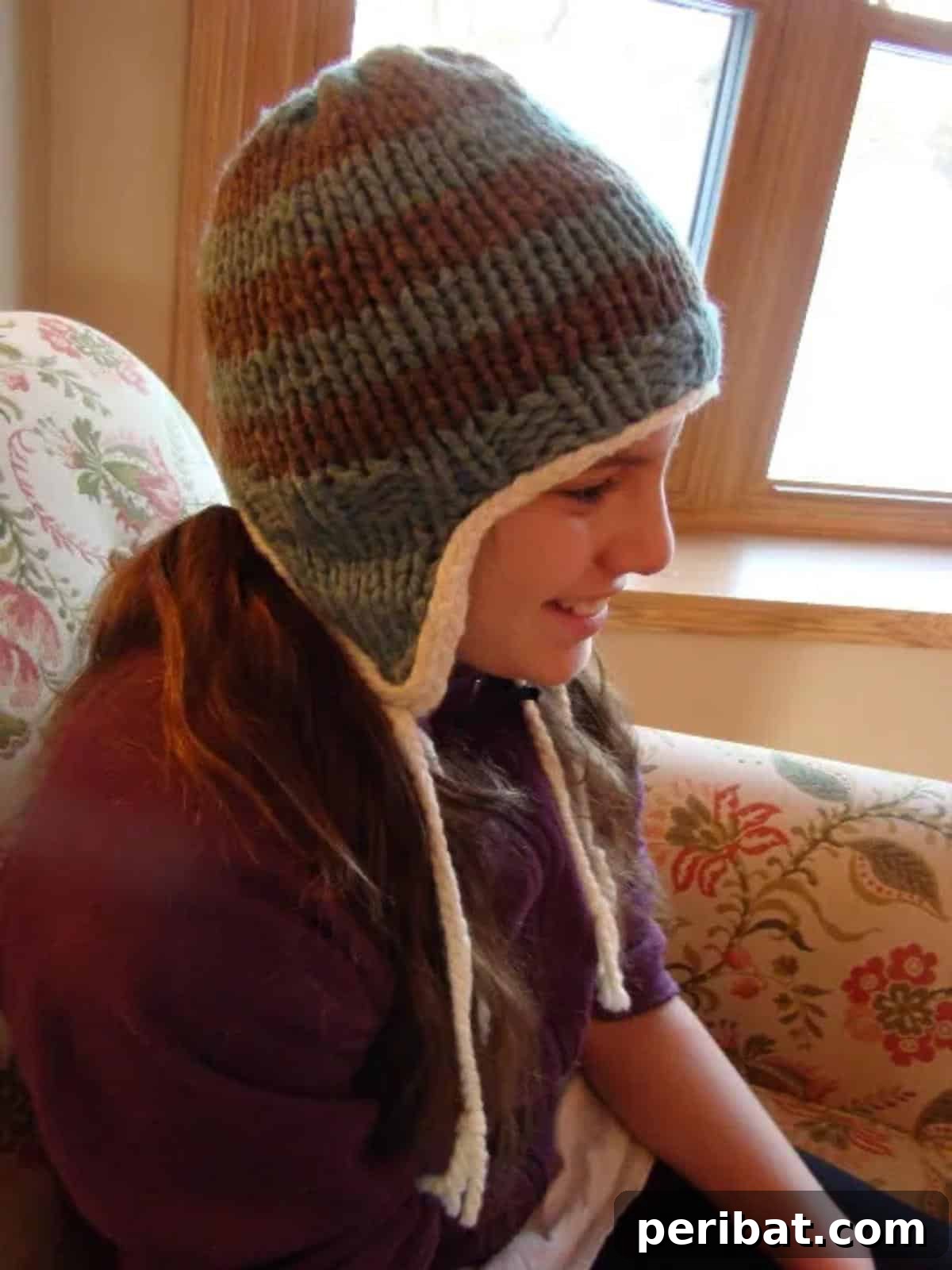 32 Cozy Ear Flap Hat Knitting Designs 25 The TC Cozy Hat, a modern and stylish earflap hat made from a blend of wool and cotton.