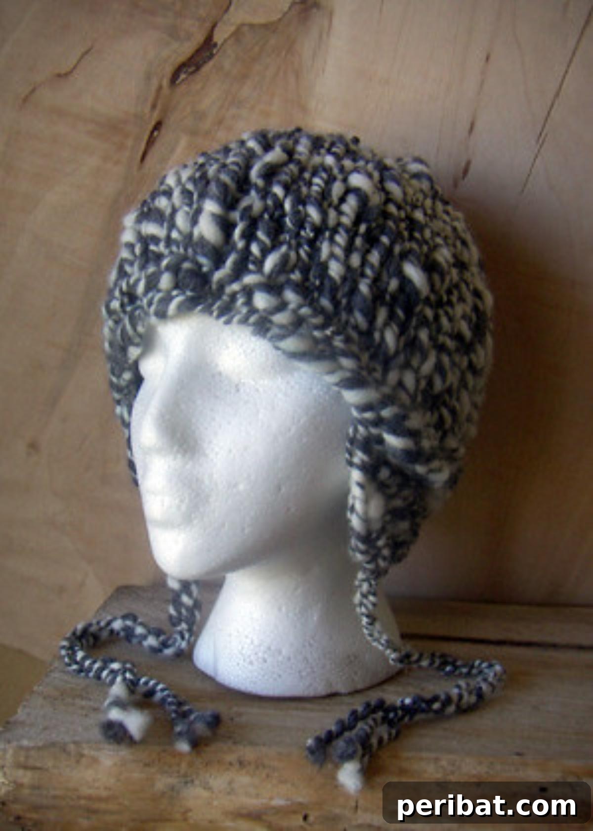 32 Cozy Ear Flap Hat Knitting Designs 26 A Superspeedy Superbulky Handspun Hat with earflaps, demonstrating a quick and sustainable knitting project.