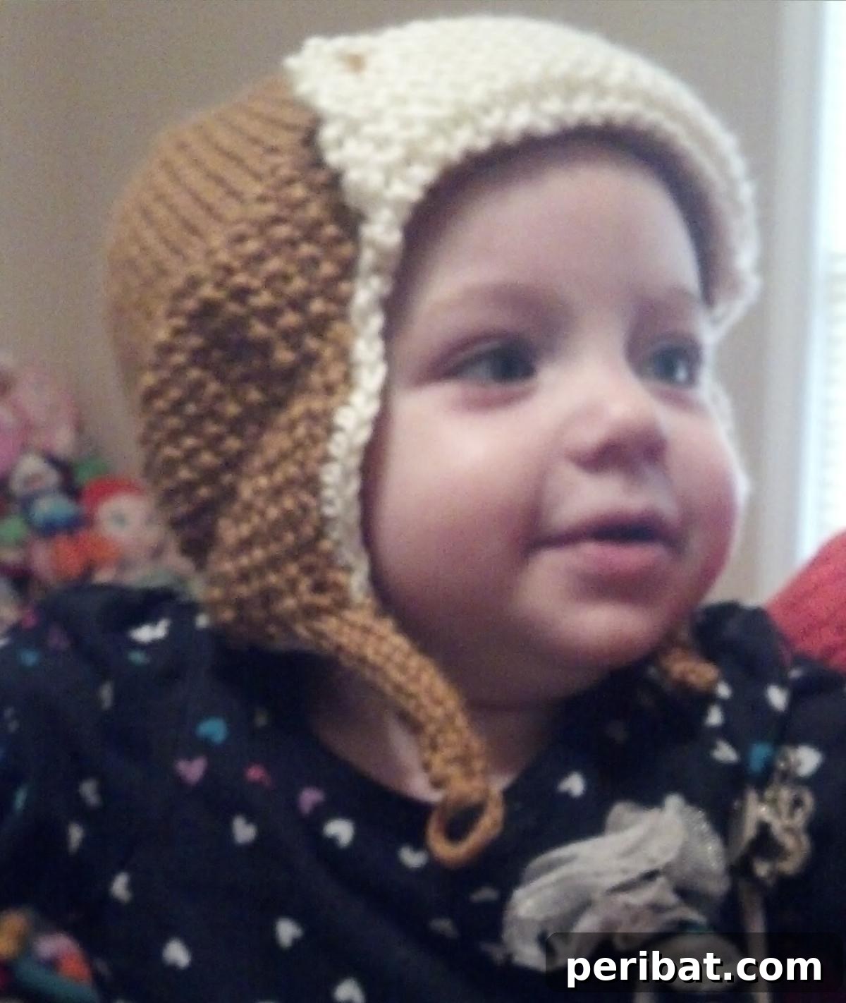32 Cozy Ear Flap Hat Knitting Designs 28 A cute Aviator Hat for toddlers, perfect for their imaginative adventures, knitted with worsted-weight yarn.