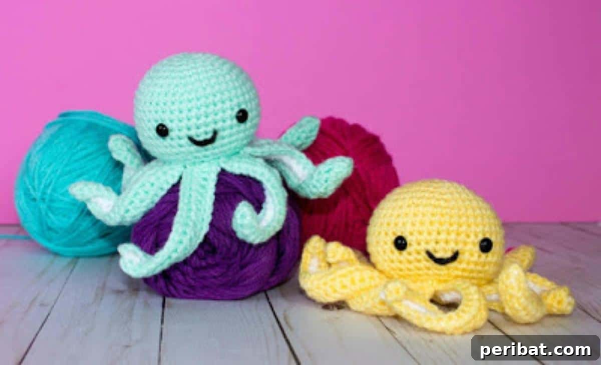 Several colorful amigurumi crochet mini octopuses with large eyes.