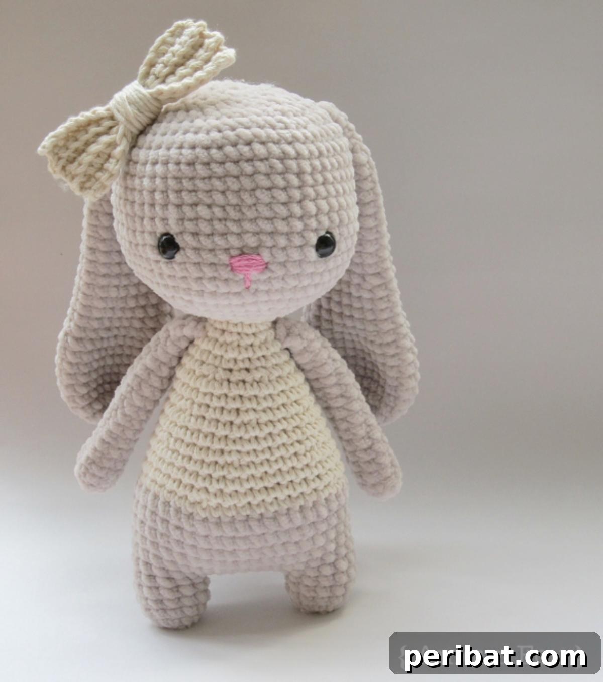Bruna, a lovely amigurumi bunny, wearing a sweet cotton t-shirt.