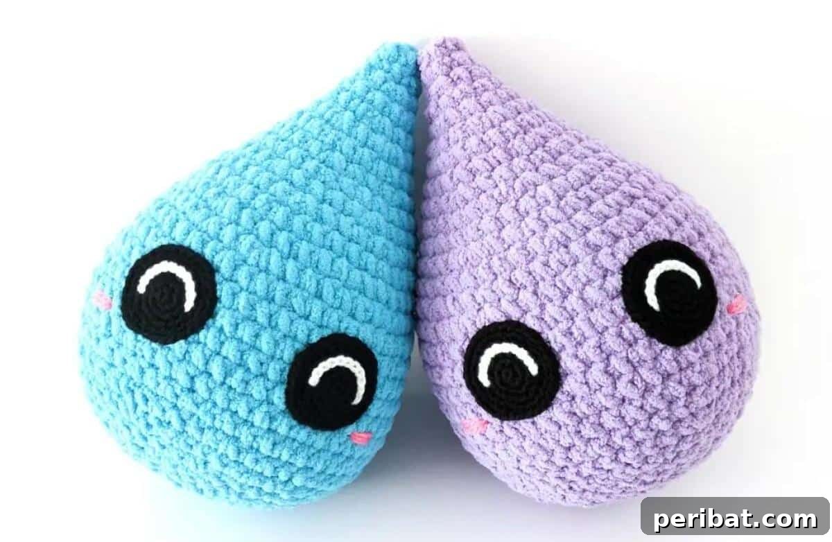 33 Cuddly Amigurumi Friends to Crochet 17 A cute and simple amigurumi raindrop, featuring a gentle blue color and a small, happy face.