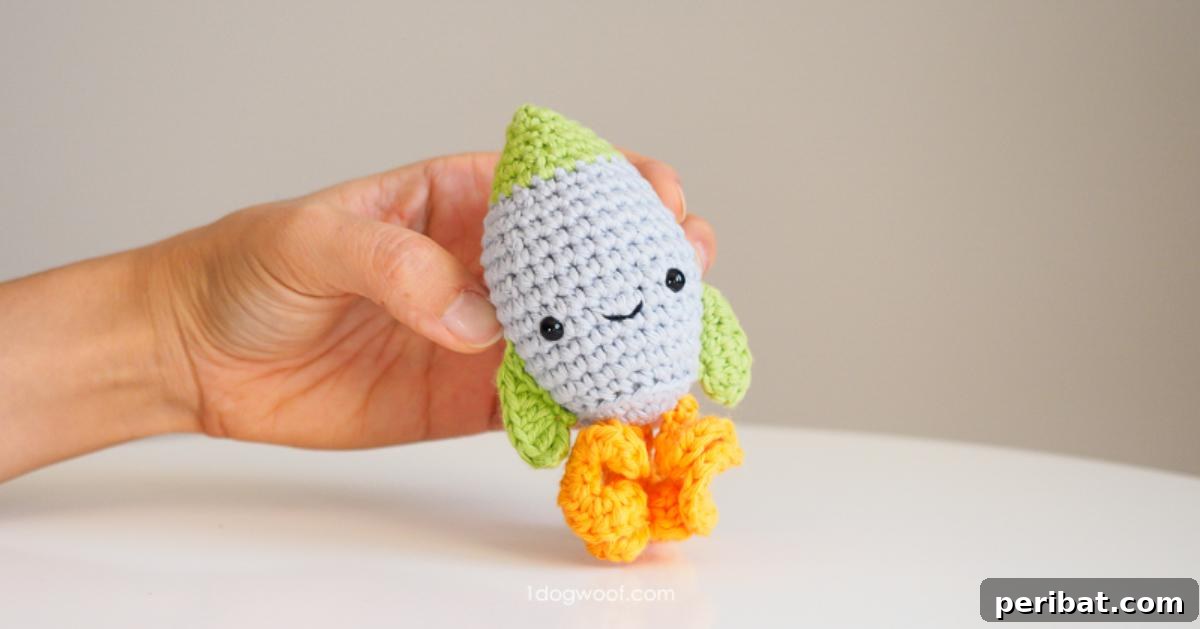 33 Cuddly Amigurumi Friends to Crochet 19 A vibrant amigurumi rocket crochet pattern, poised for an imaginative blast-off into space.