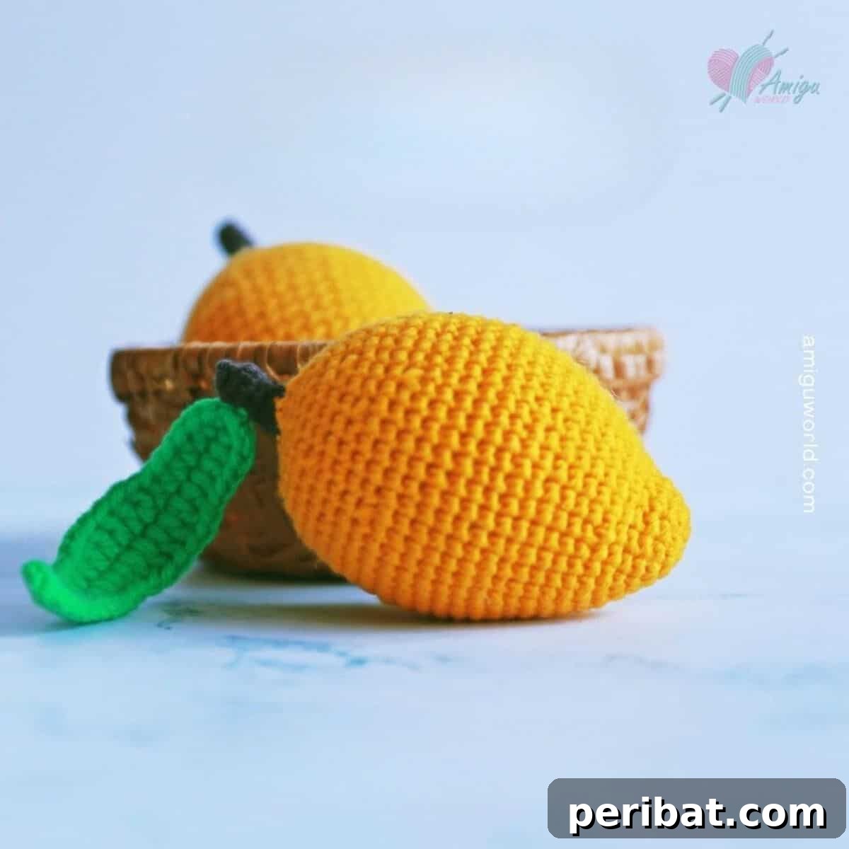 33 Cuddly Amigurumi Friends to Crochet 21 A sunny yellow crochet mango amigurumi, bringing tropical summer vibes.