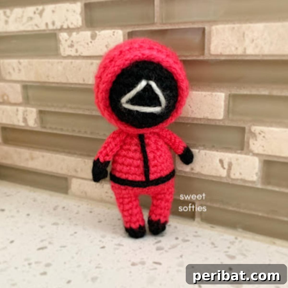 33 Cuddly Amigurumi Friends to Crochet 24 A crochet Squid Game Doll, available in innocent player attire and the iconic pink guard uniform.