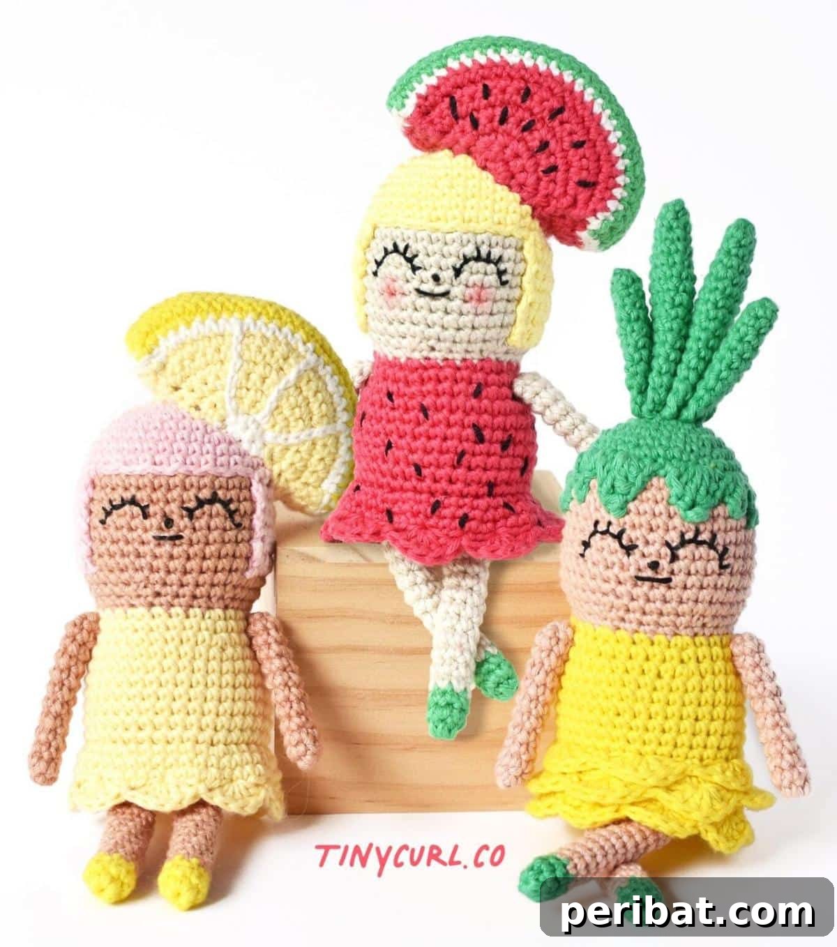 33 Cuddly Amigurumi Friends to Crochet 28 A trio of sweet amigurumi fruit girls: Watermelon Girl, Lemon Girl, and Pineapple Girl, each with unique fruit-inspired attire.