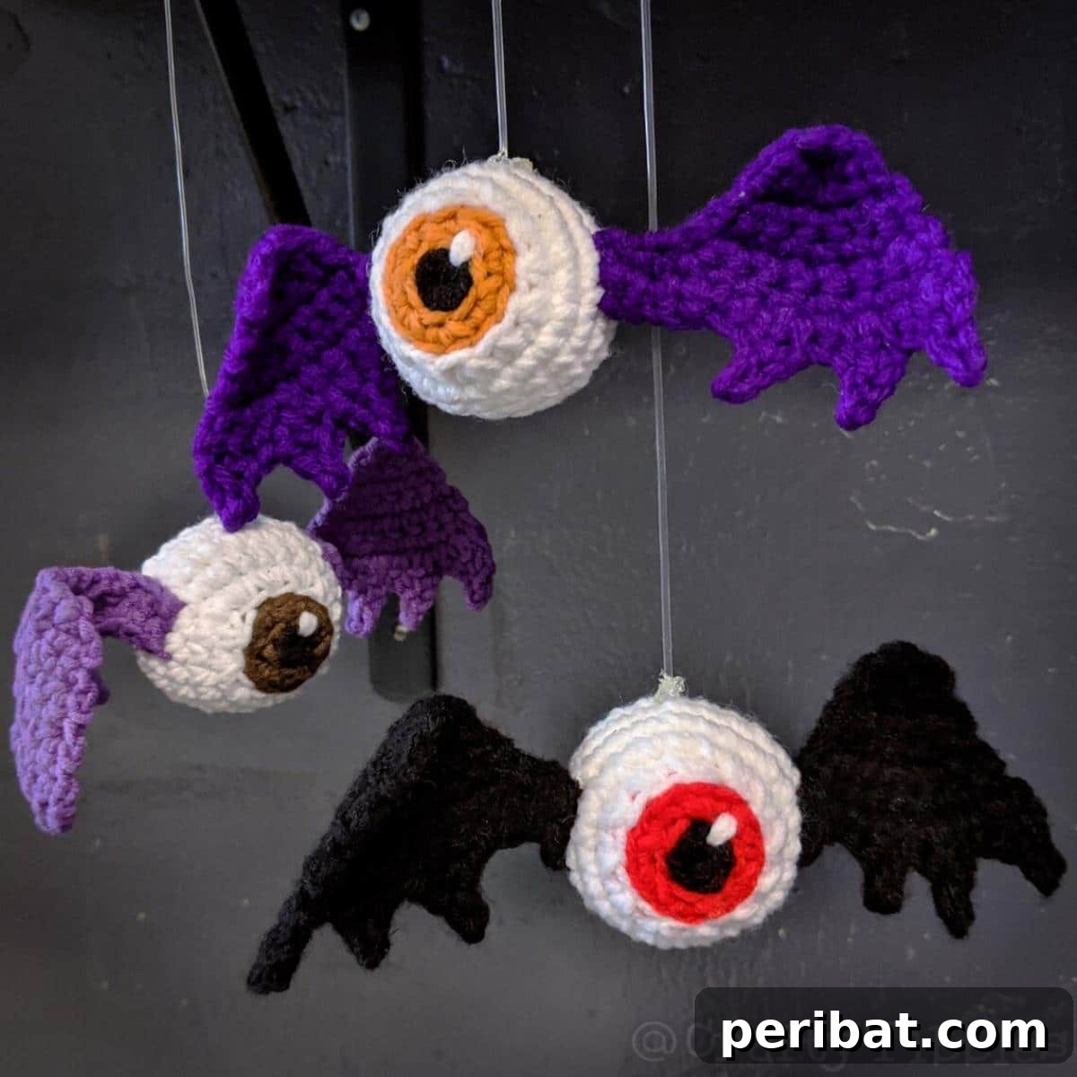33 Cuddly Amigurumi Friends to Crochet 33 A spooky eyeball pack crochet amigurumi, featuring a flower with an eyeball center, a winged flying eyeball, and classic eyeballs.