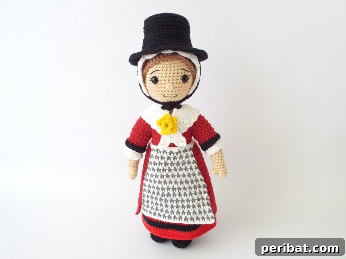 33 Cuddly Amigurumi Friends to Crochet 35 Gwen the Welsh Doll amigurumi, proudly dressed in a traditional daffodil-inspired outfit, embodying Welsh heritage.