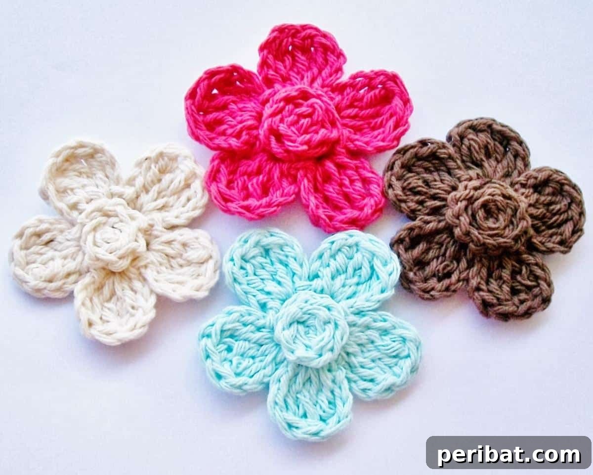 A simple yet elegant crochet flower in purple, showcasing its delicate petals and classic design.