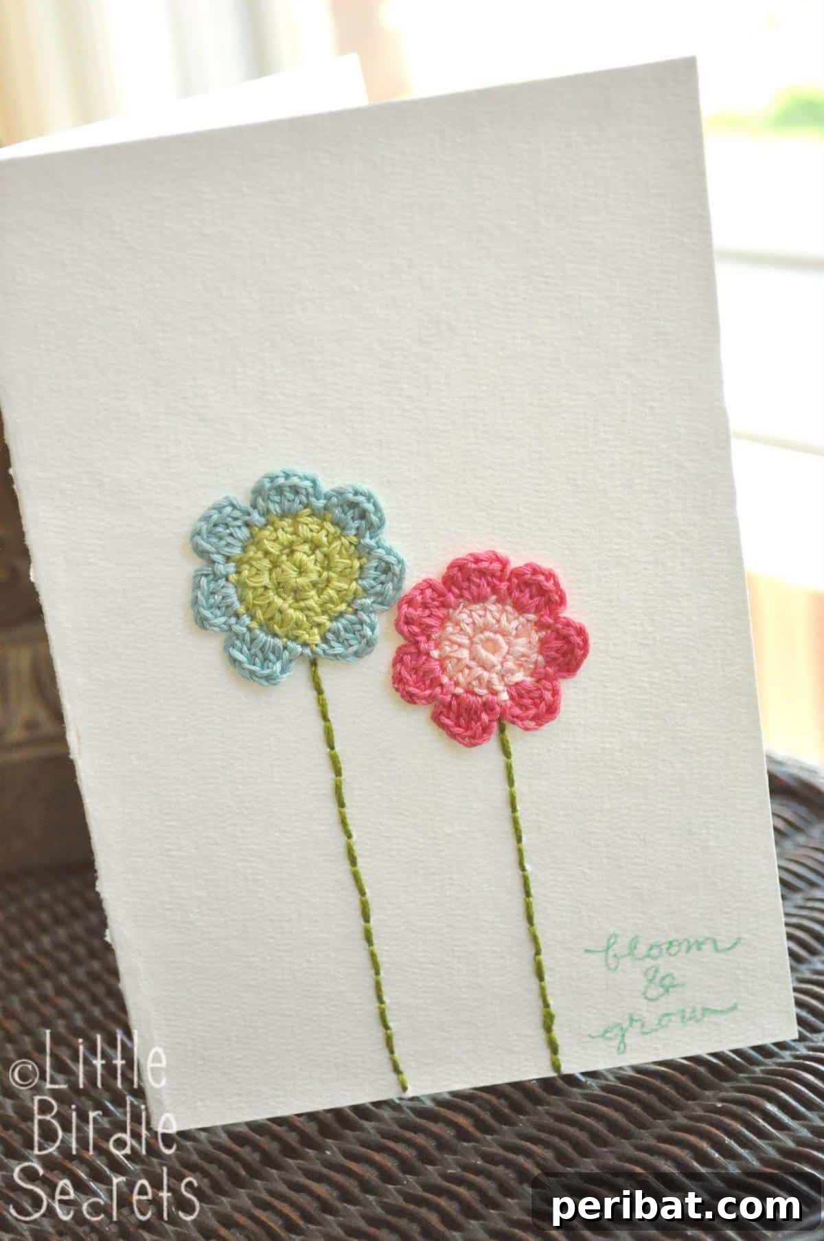 An elegant seven-petal crochet flower in a soft shade, demonstrating its sophisticated structure.