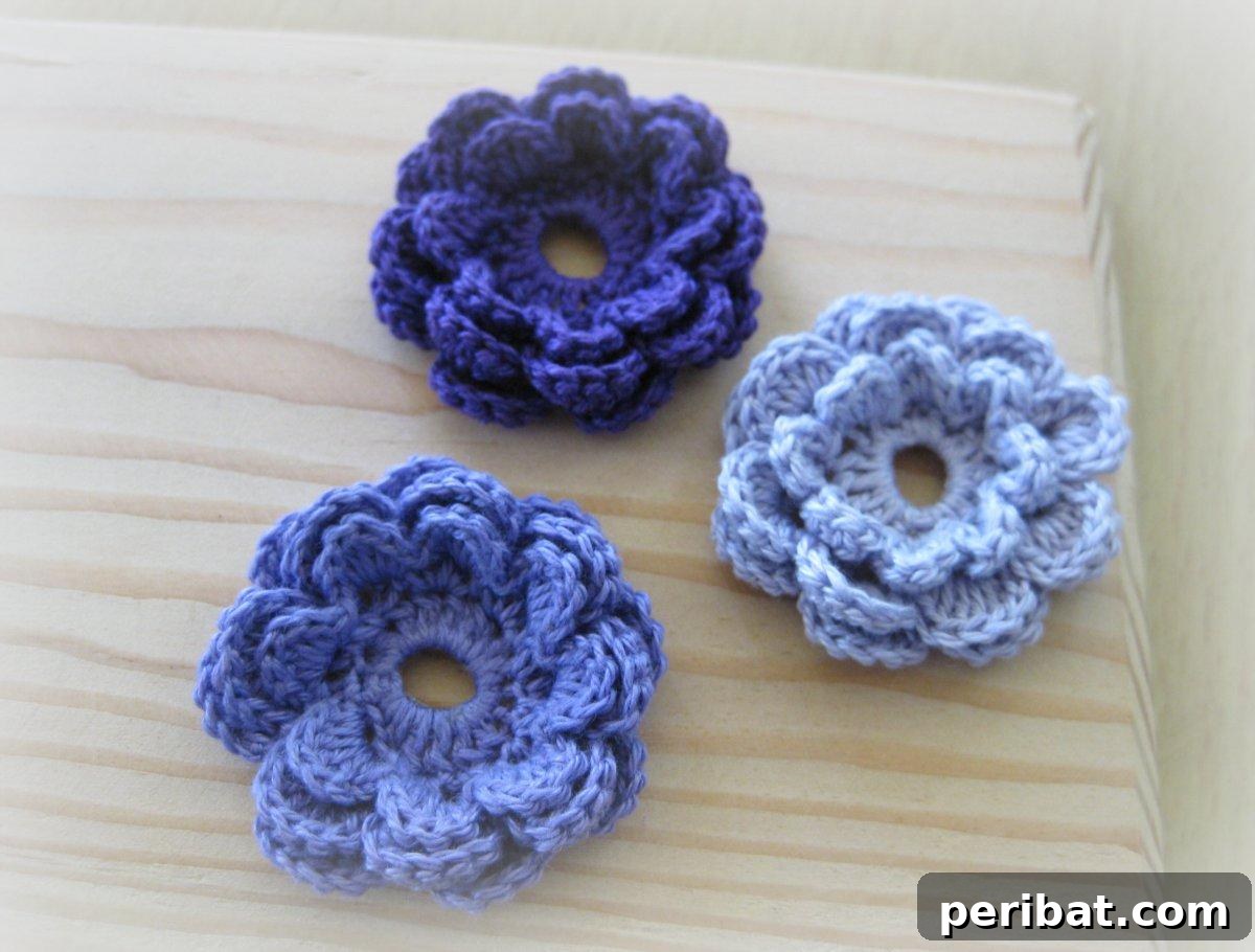 A charming blue crochet flower accent, highlighting its versatility for various uses.