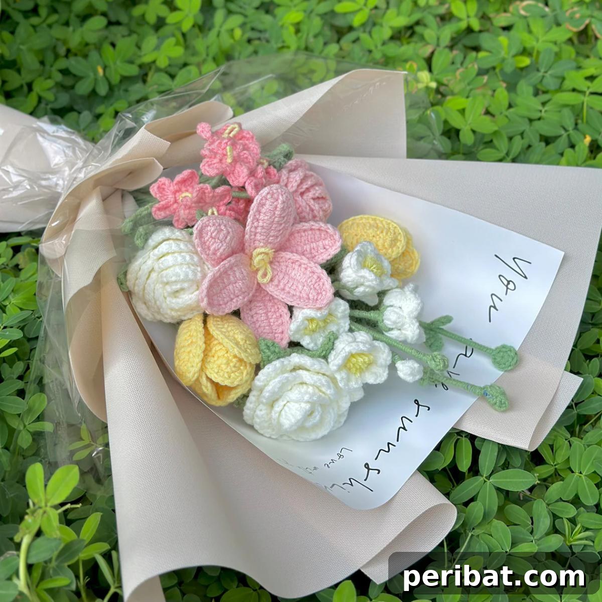 A diverse crochet flower bouquet, featuring multiple types of blooms in a beautiful arrangement.