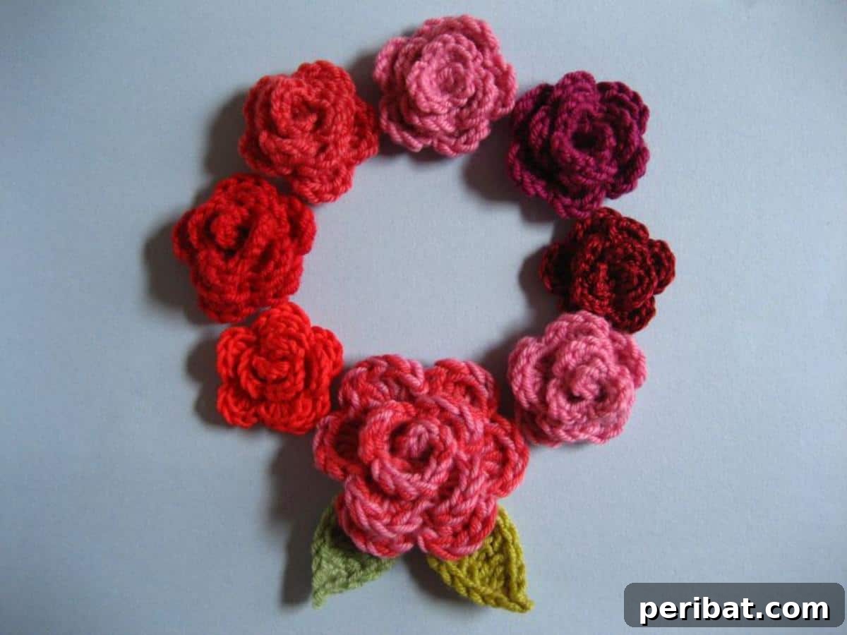 Soft pink crochet May Roses arranged artfully, exuding a romantic and delicate appeal.
