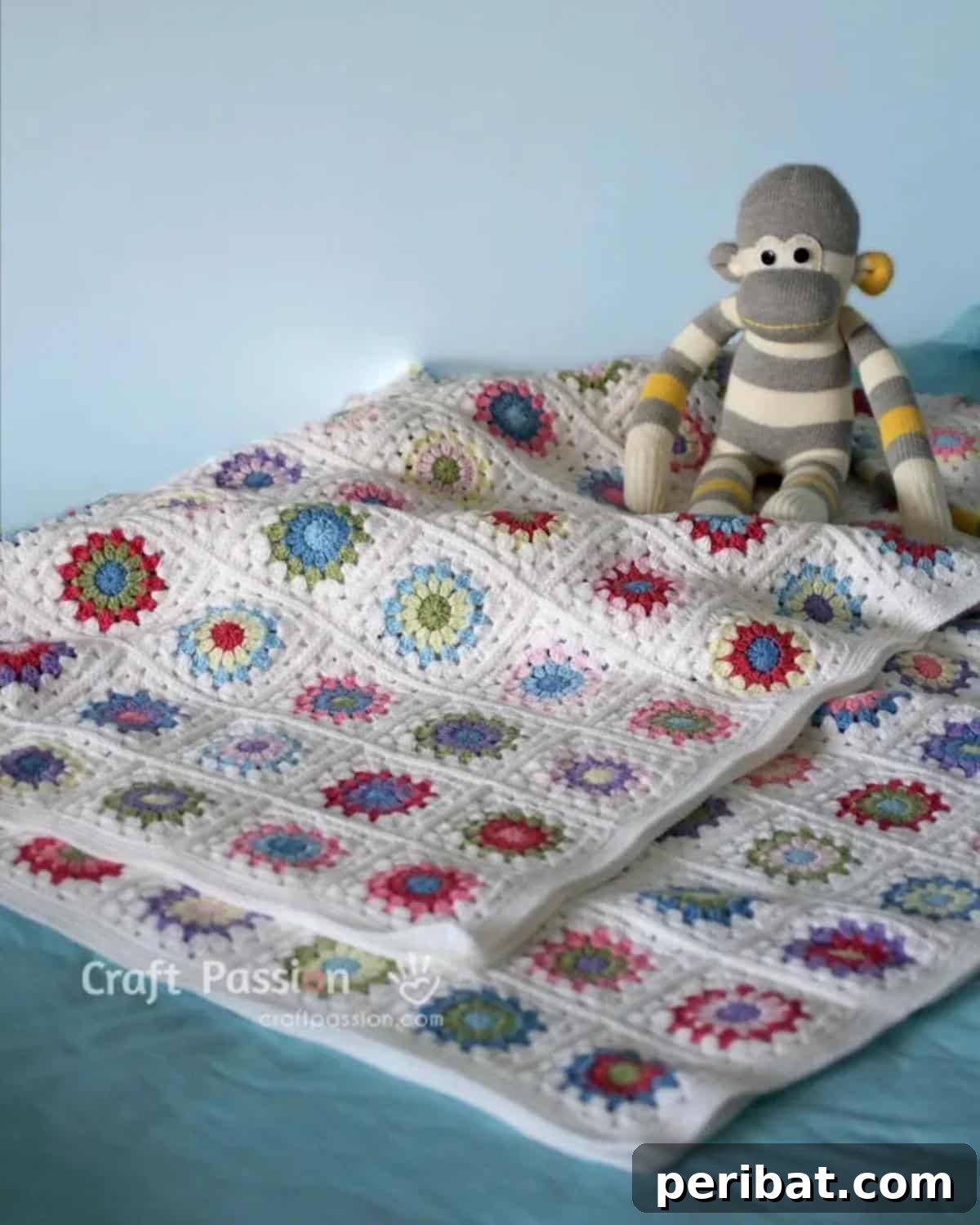 38 Creative Crochet Square Designs 4 A vibrant sunburst granny square crochet blanket pattern with radiating colors.
