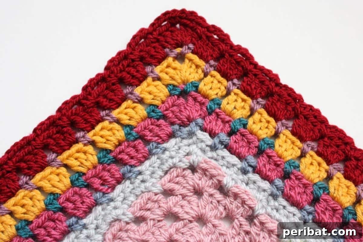 37 Stunning Crochet Edging Designs 31 Grannie Patches Border, a vibrant and modular crochet edging.