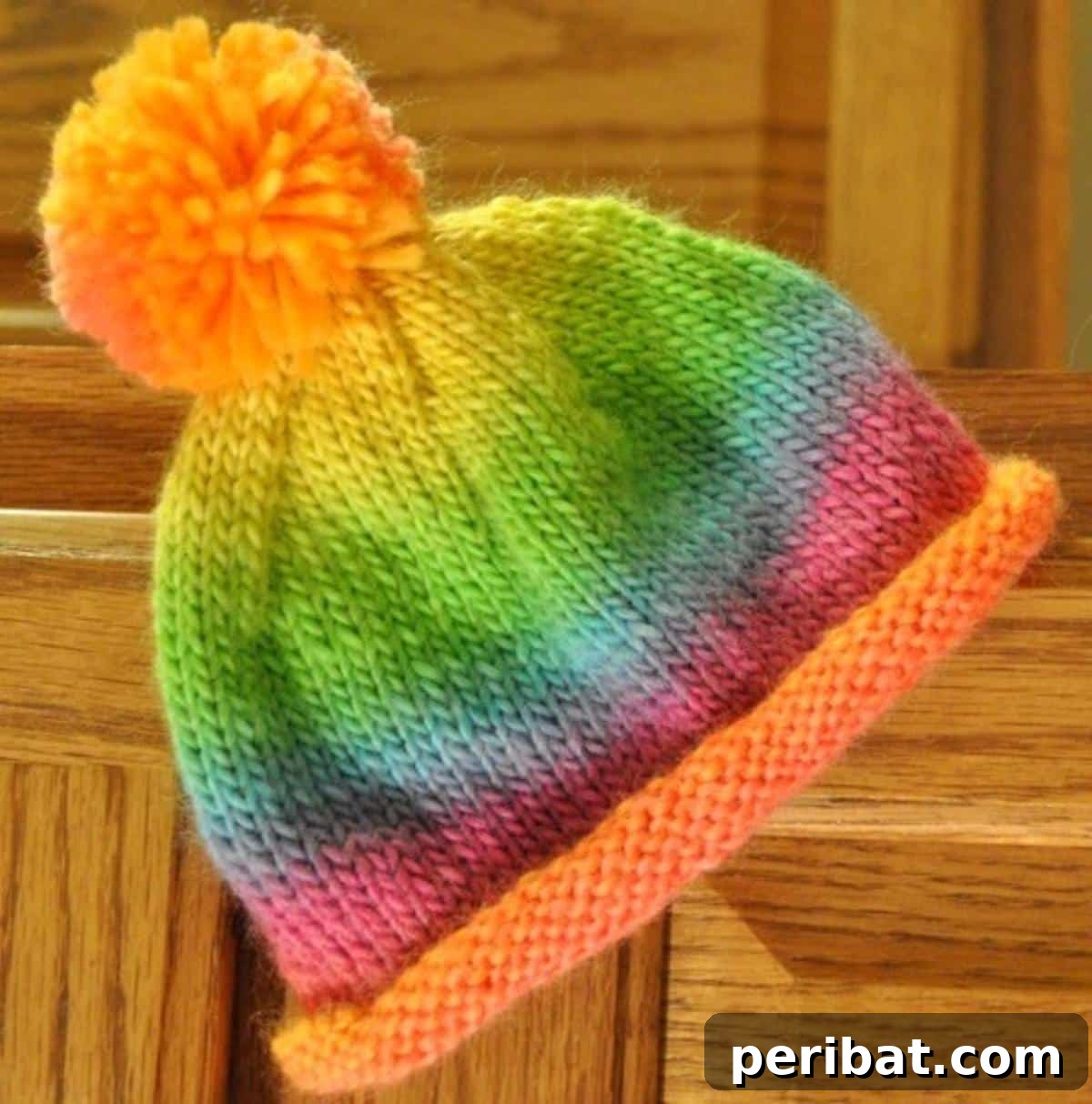 Cozy Knits: 40 Free Beanie Patterns and Tutorials 28 A simple yet adaptable Easy Rolled Brim Hat, knitted on double-pointed needles, offering a stretchy fit and an adjustable brim for personalized comfort and style.