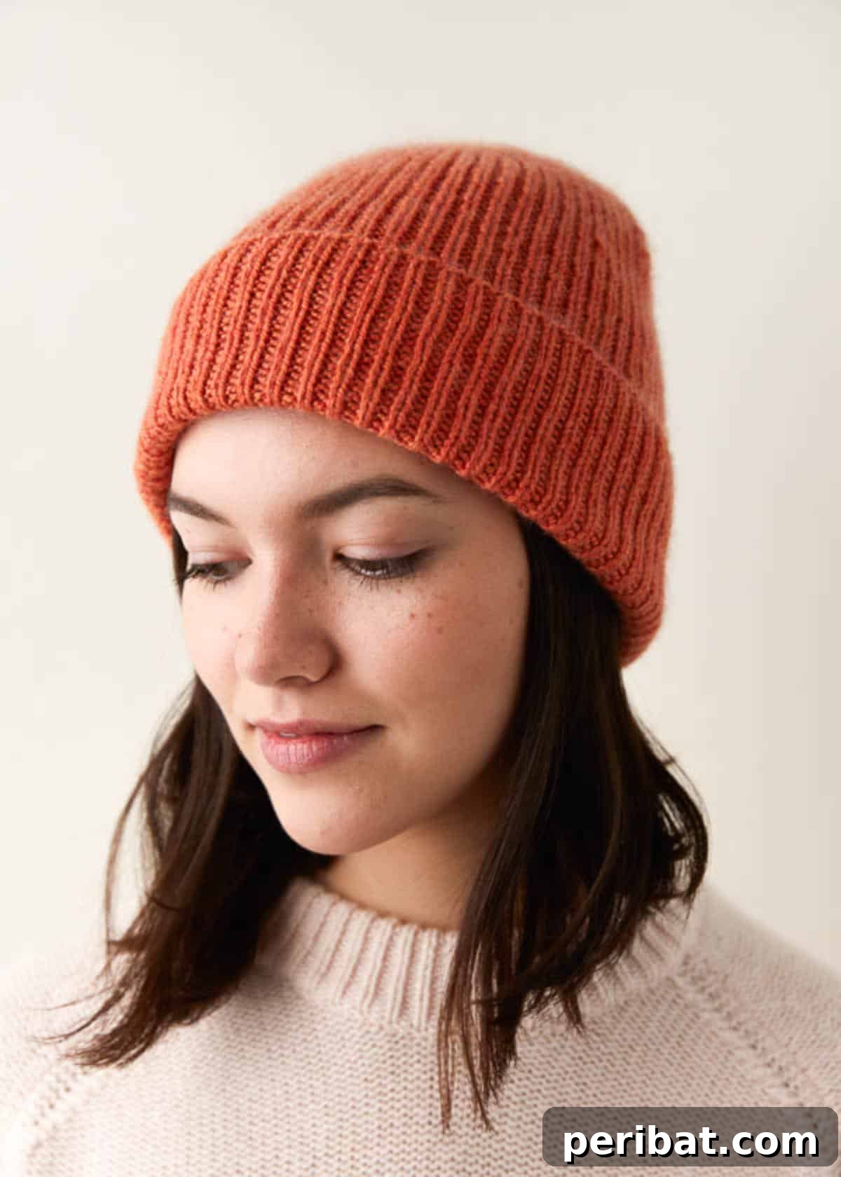 Cozy Knits: 40 Free Beanie Patterns and Tutorials 4 A timeless and versatile classic ribbed knit hat, suitable for any occasion and easily styled either cuffed or slouchy for different looks.