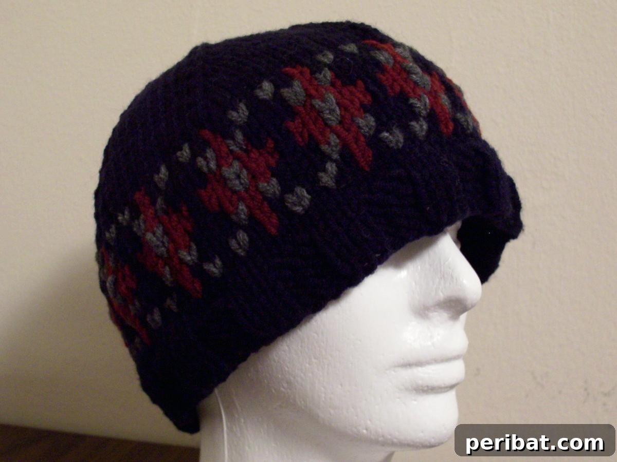 Cozy Knits: 40 Free Beanie Patterns and Tutorials 31 The stylish Argyle Cap, featuring a slouchy fit with a navy base, claret diamonds, and charcoal diagonal lines added with duplicate stitches, along with a complete guide.