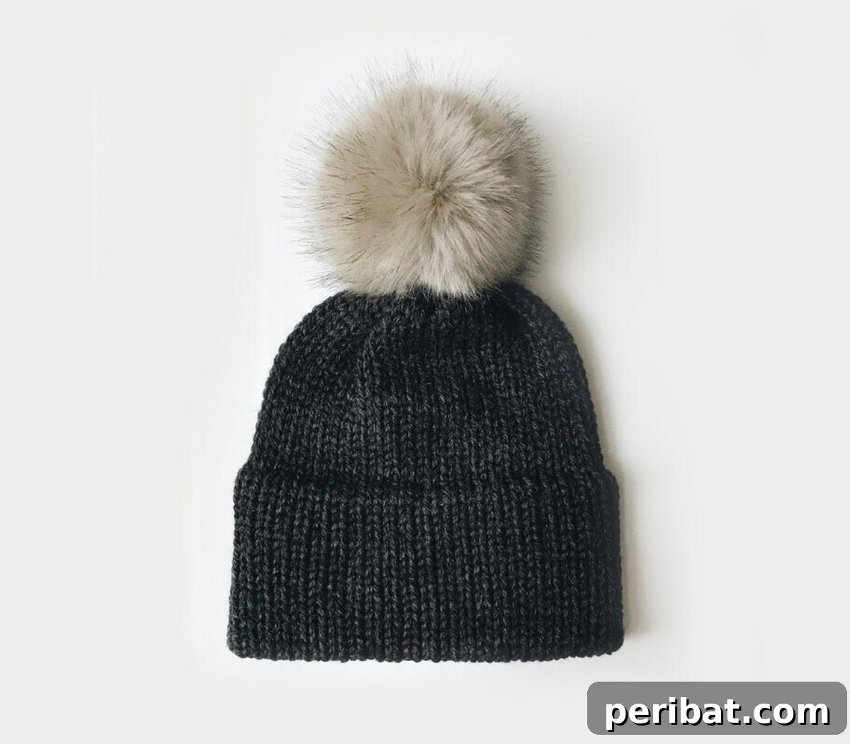Cozy Knits: 40 Free Beanie Patterns and Tutorials 41 An elegant double brim knitted beanie pattern, perfect for creating a stylish slouchy design for women, featuring a simple and easily memorized knit for effortless crafting.