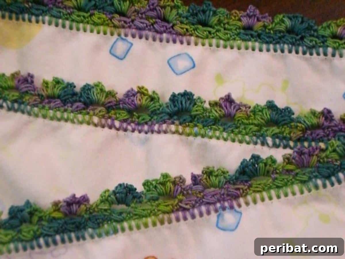 38 Creative Crochet Edging Ideas 15 Playful Puffy Lace Edging with a three-dimensional effect, great for baby items.