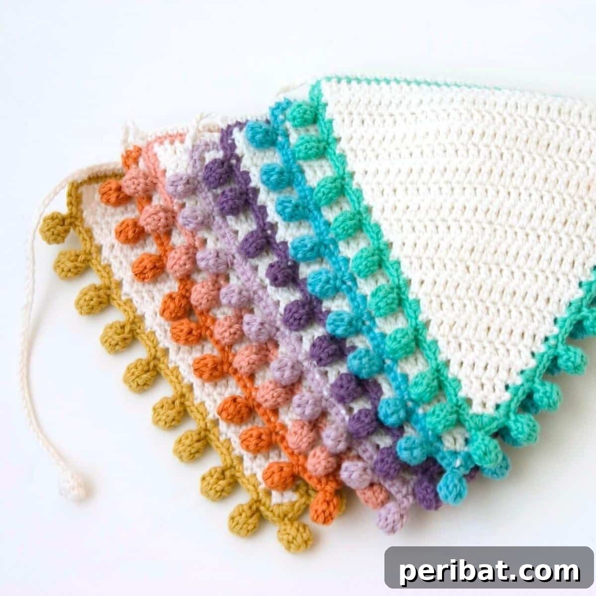 38 Creative Crochet Edging Ideas 38 Festive Bunting Flags with Bobble Edgings, photo tutorial for various sizes.