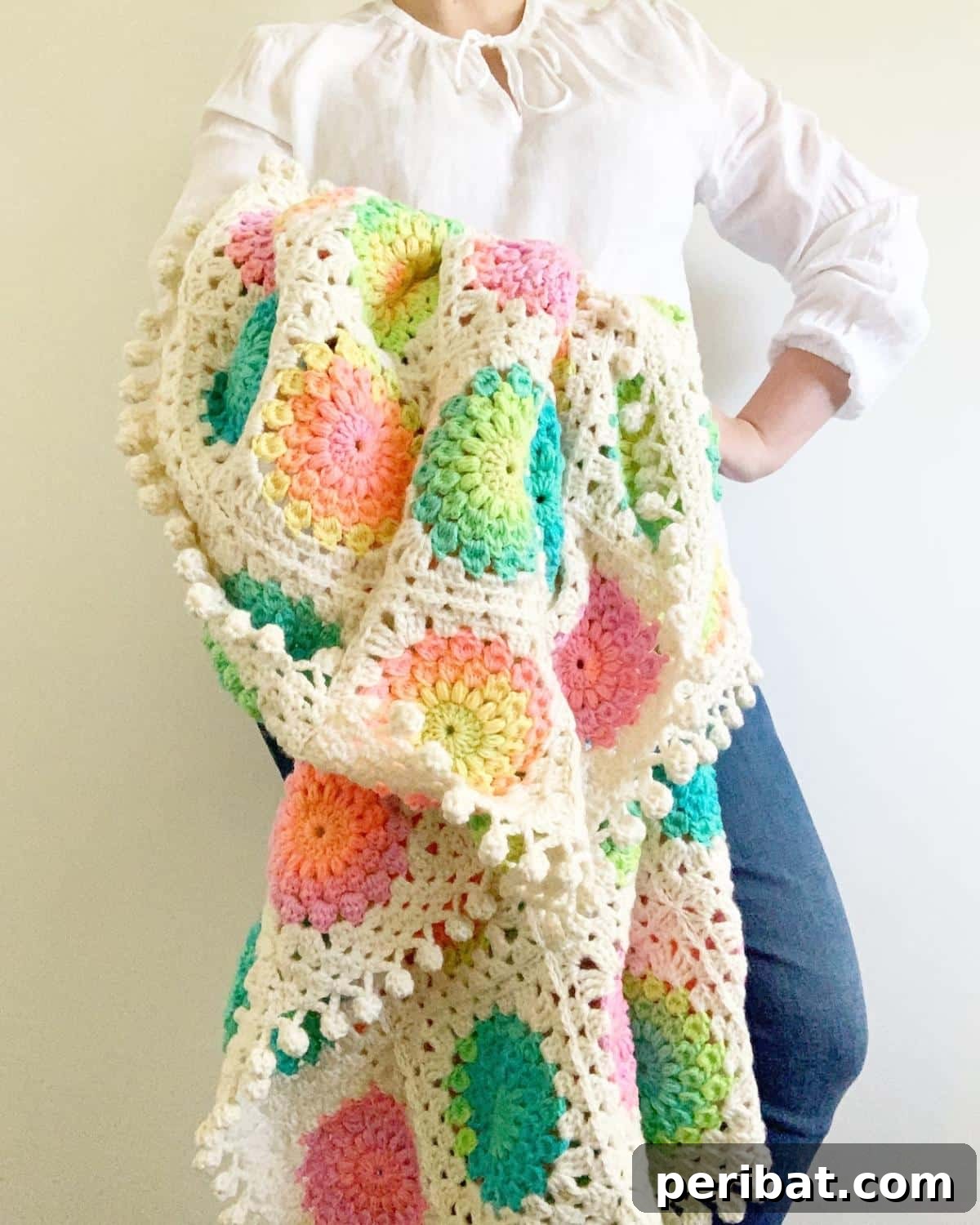 21 Cozy Red Heart Yarn Crochet Projects 22 Retro Stripe Sunburst Granny Square Throw