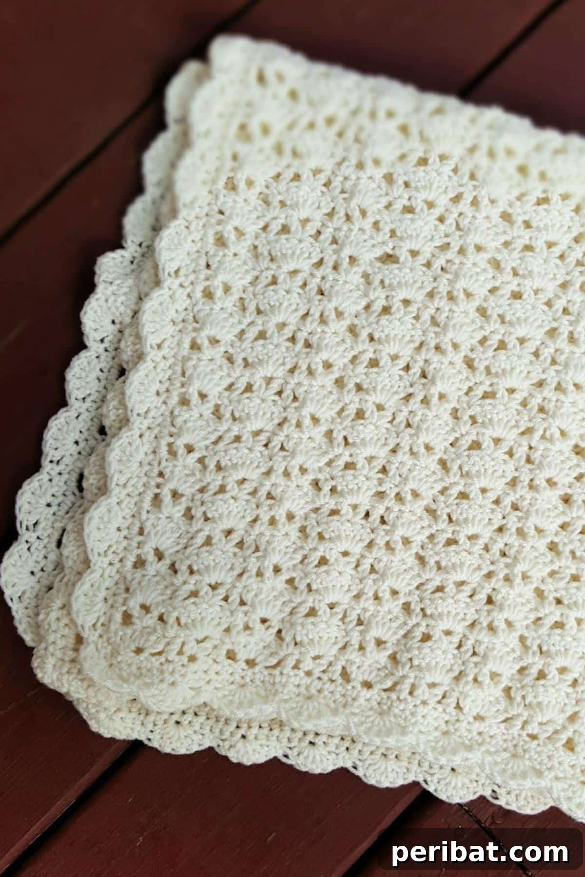 Heirloom Crochet: 40 Timeless Patterns 25 The Sarah Baby Blanket, a free vintage crochet baby blanket pattern featuring a charming textured design and a soft, cuddly feel, perfect for wrapping little ones in comfort and love.