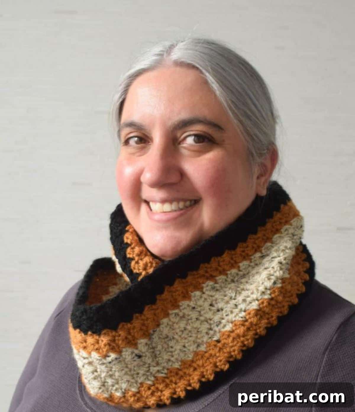 Heirloom Crochet: 40 Timeless Patterns 33 Versatile Vintage Infinity Scarf crafted with neutral colors and simple stitches, making a great unisex handmade gift for any occasion, embodying timeless 70s style.