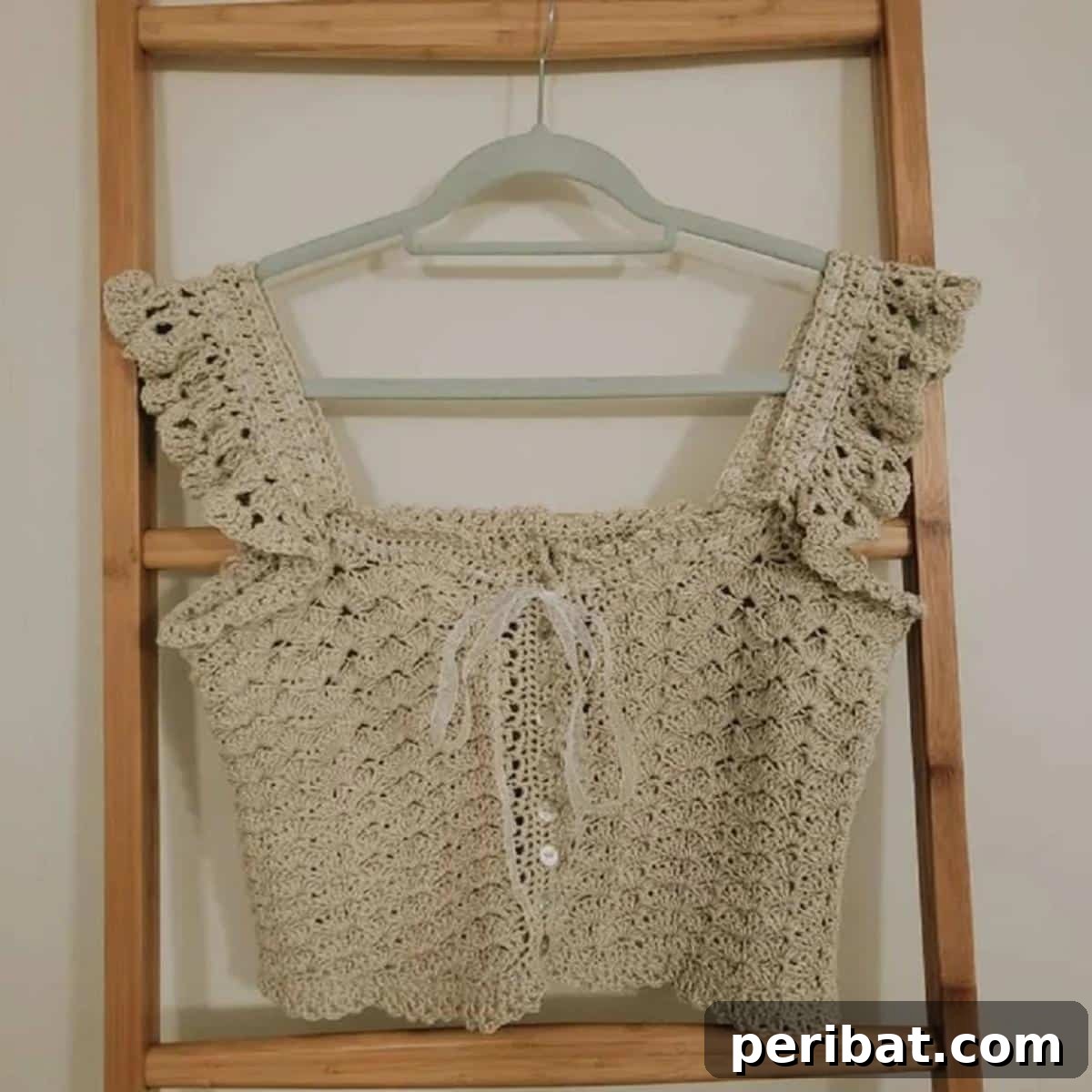 Heirloom Crochet: 40 Timeless Patterns 38 Charming Vintage Crochet Beribboned Camisole, a timeless piece featuring intricate patterns and stitches, enhanced with ribbon detailing, perfect for elegant layering.