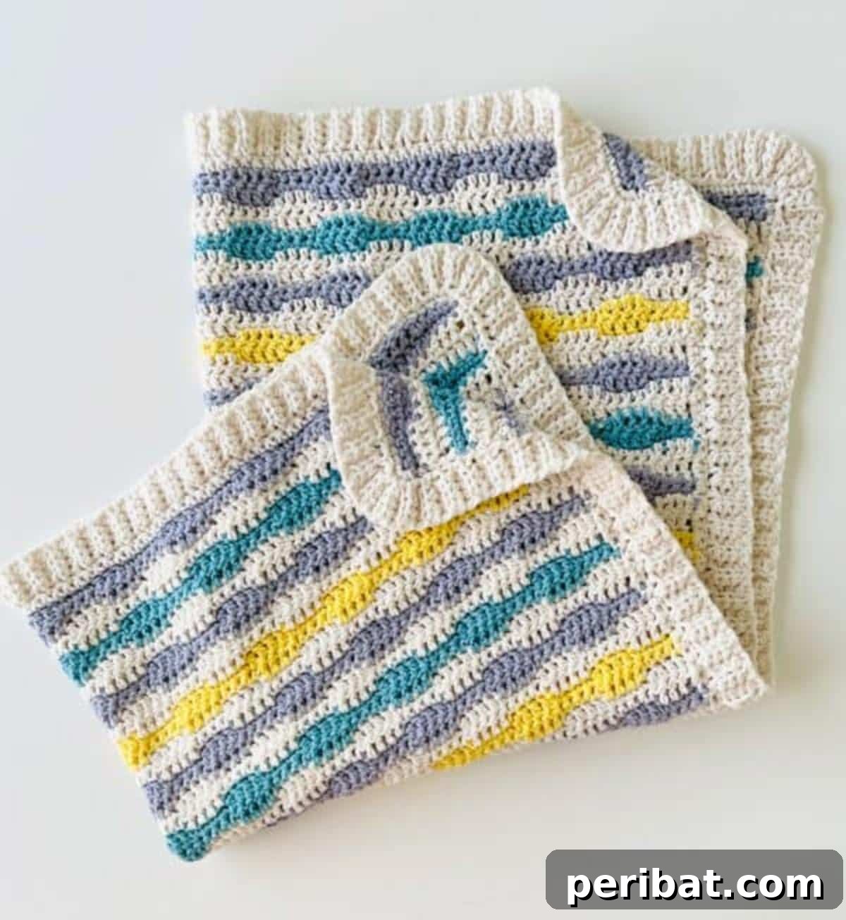 Heirloom Crochet: 40 Timeless Patterns 6 Colorful Crochet Retro Waves Baby Blanket with interlocking single and double crochet patterns, providing groovy comfort for little ones.