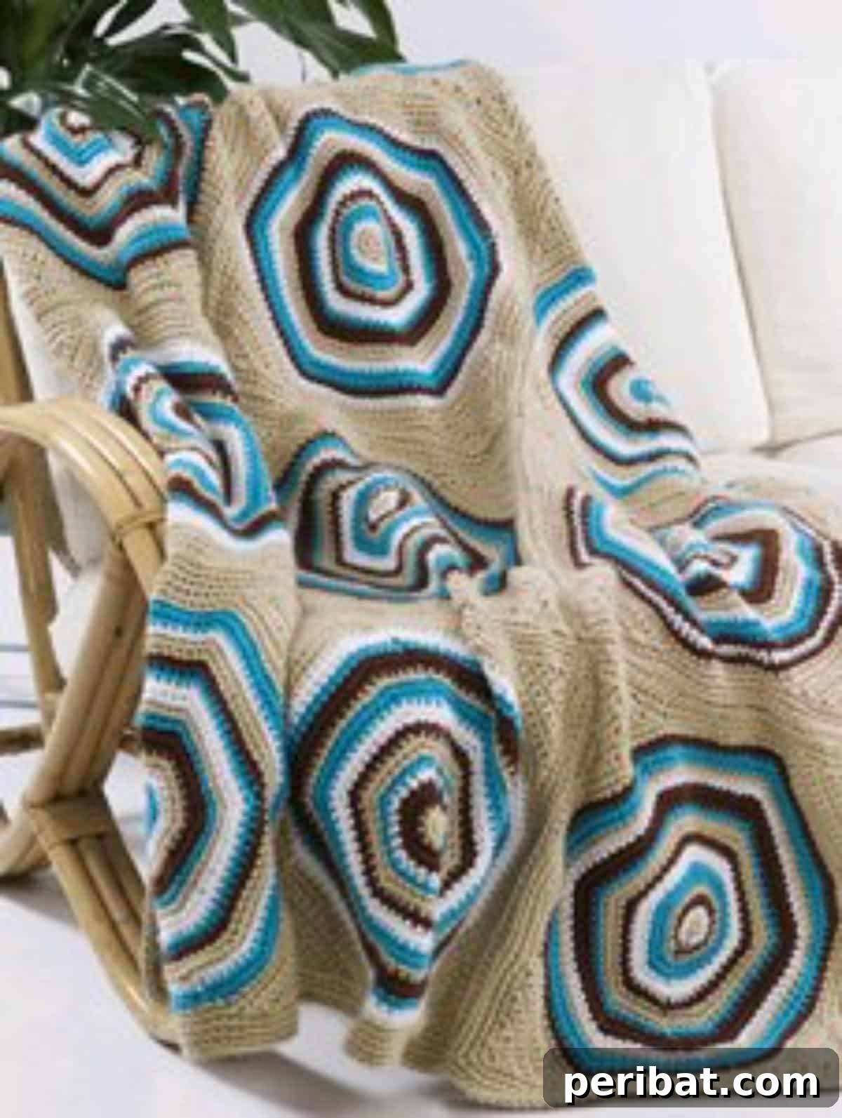 Heirloom Crochet: 40 Timeless Patterns 7 Stunning Retro Circle Afghan featuring mesmerizing circular motifs in vibrant, bold hues, perfect for making a statement in any living space.