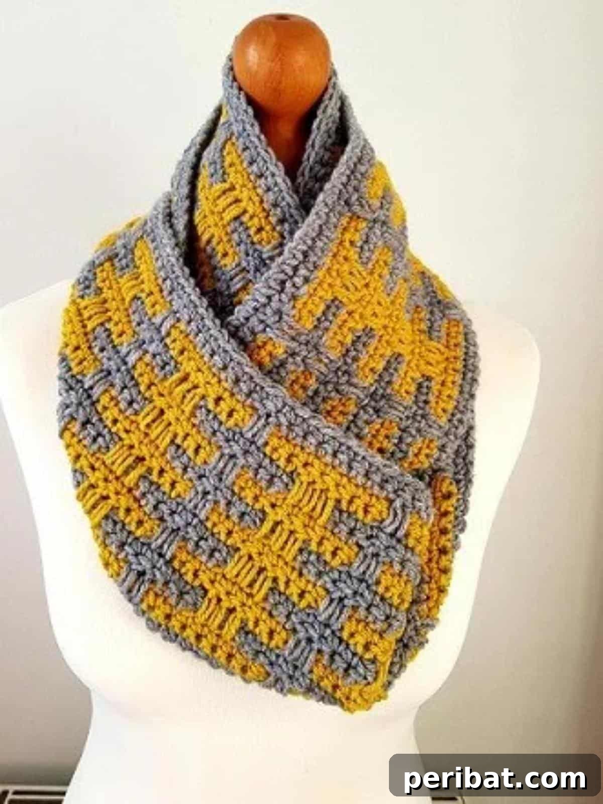 29 Creative Mosaic Crochet Patterns 3 Easy Mosaic Crochet Scarf - A stylish, cozy infinity scarf featuring a simple yet striking mosaic crochet pattern in two contrasting colors, ideal for beginners.