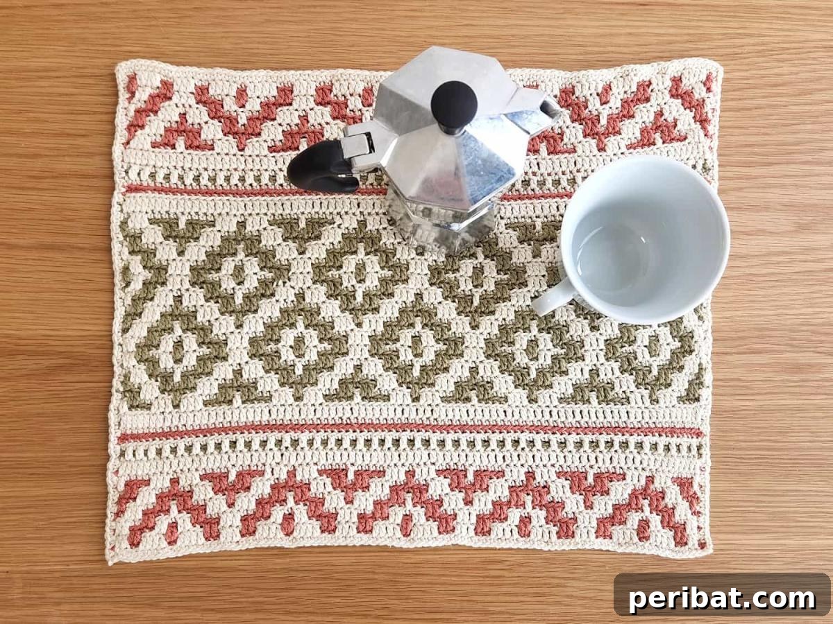 29 Creative Mosaic Crochet Patterns 10 Mosaic Crochet Placemat - A decorative placemat with an intricate bohemian-style mosaic crochet pattern, perfect for enhancing dining table aesthetics.