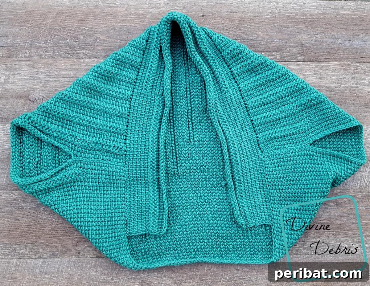 29 Beautiful Tunisian Crochet Projects 14 Easy Tunisian DIY Crochet Shrug, a simple yet eye-catching garment perfect for layering.