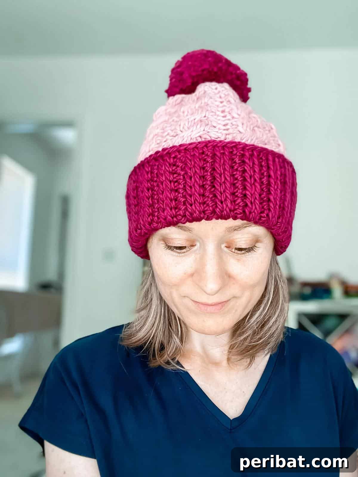 29 Beautiful Tunisian Crochet Projects 16 Radley Tunisian Hat, a cozy two-tone hat featuring intricate ribbing and cable patterns.