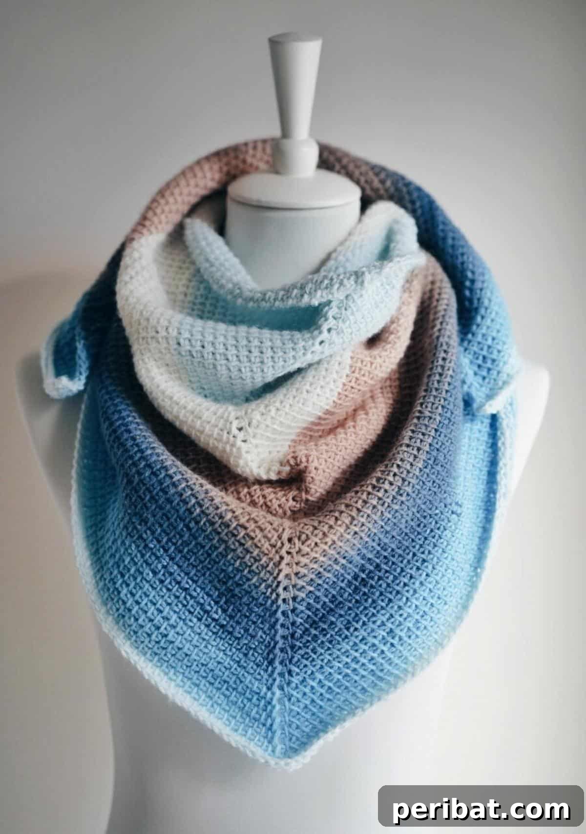 29 Beautiful Tunisian Crochet Projects 3 Simple Tunisian Shawl, featuring a light and airy design in self-striping yarn, perfect for beginners.