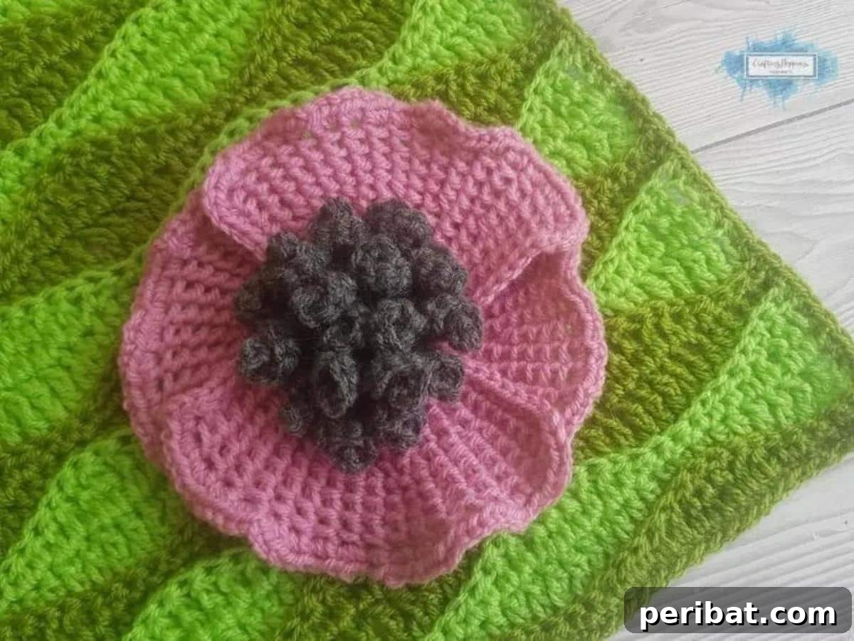 29 Beautiful Tunisian Crochet Projects 21 Tunisian Poppy Flower Applique, showcasing delicate and customizable floral accents for various crafts.