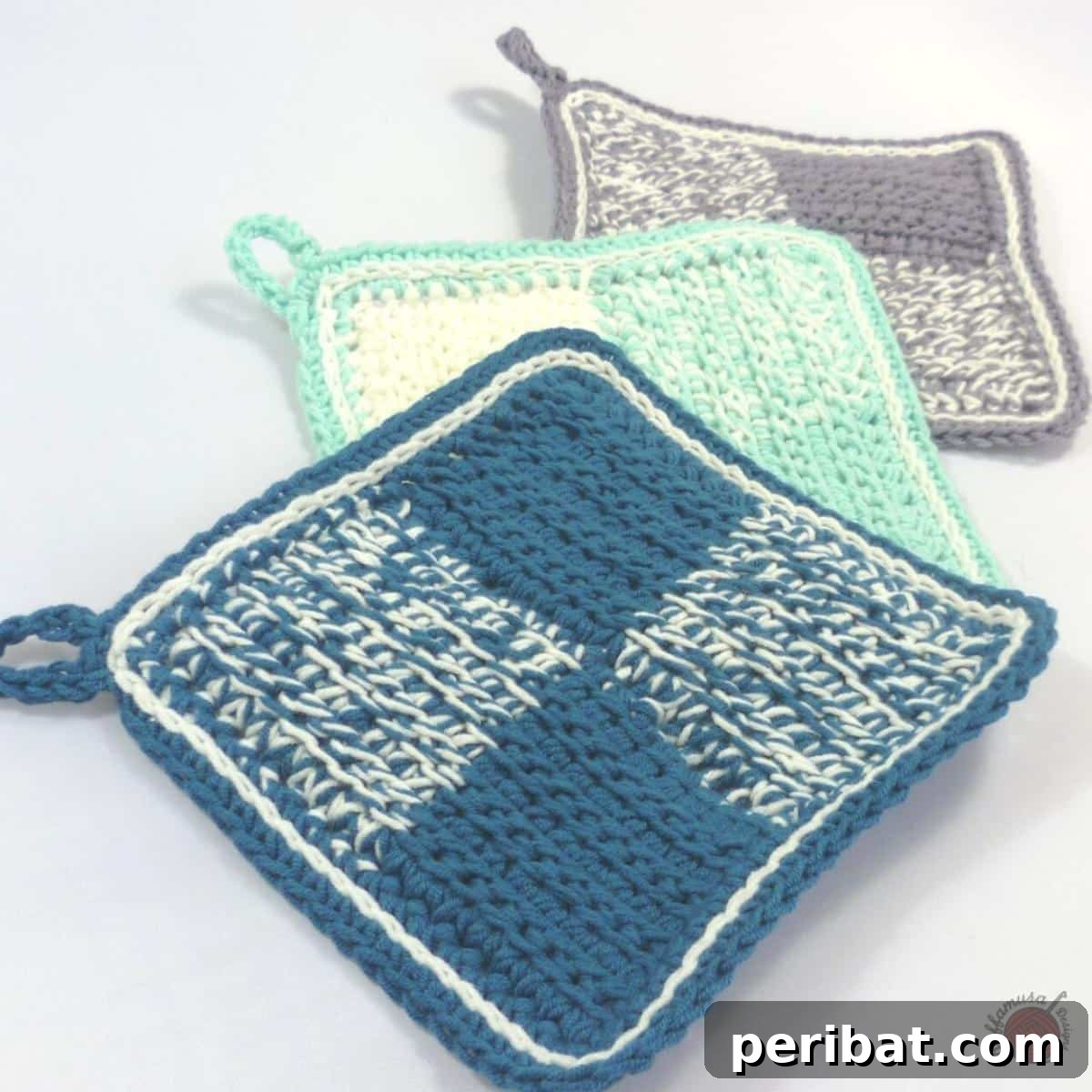 29 Beautiful Tunisian Crochet Projects 22 Tunisian Crochet Cottage Potholders, featuring a compact and solid texture, ideal for sturdy kitchen use.