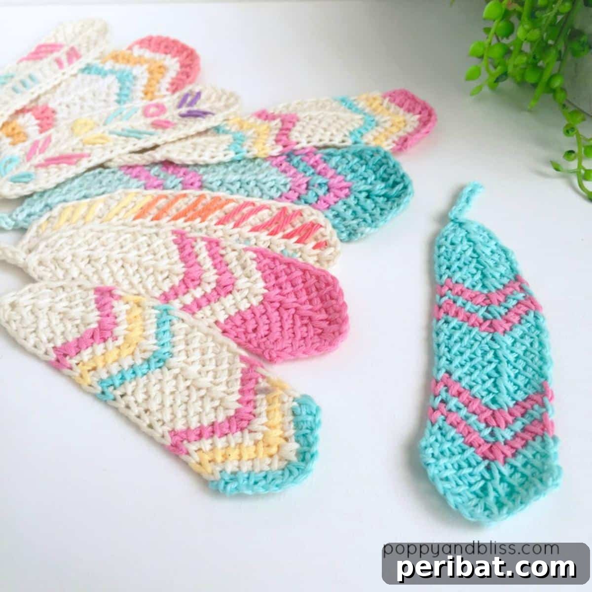 29 Beautiful Tunisian Crochet Projects 25 Tunisian Crochet Feathers, a collection of colorful and versatile decorative elements for various projects.