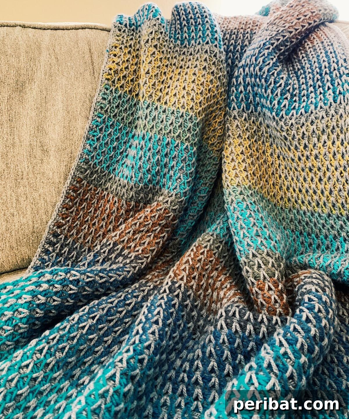 29 Beautiful Tunisian Crochet Projects 29 Tunisian Crochet Throw Blanket, a textured and colorful addition for home comfort and style.