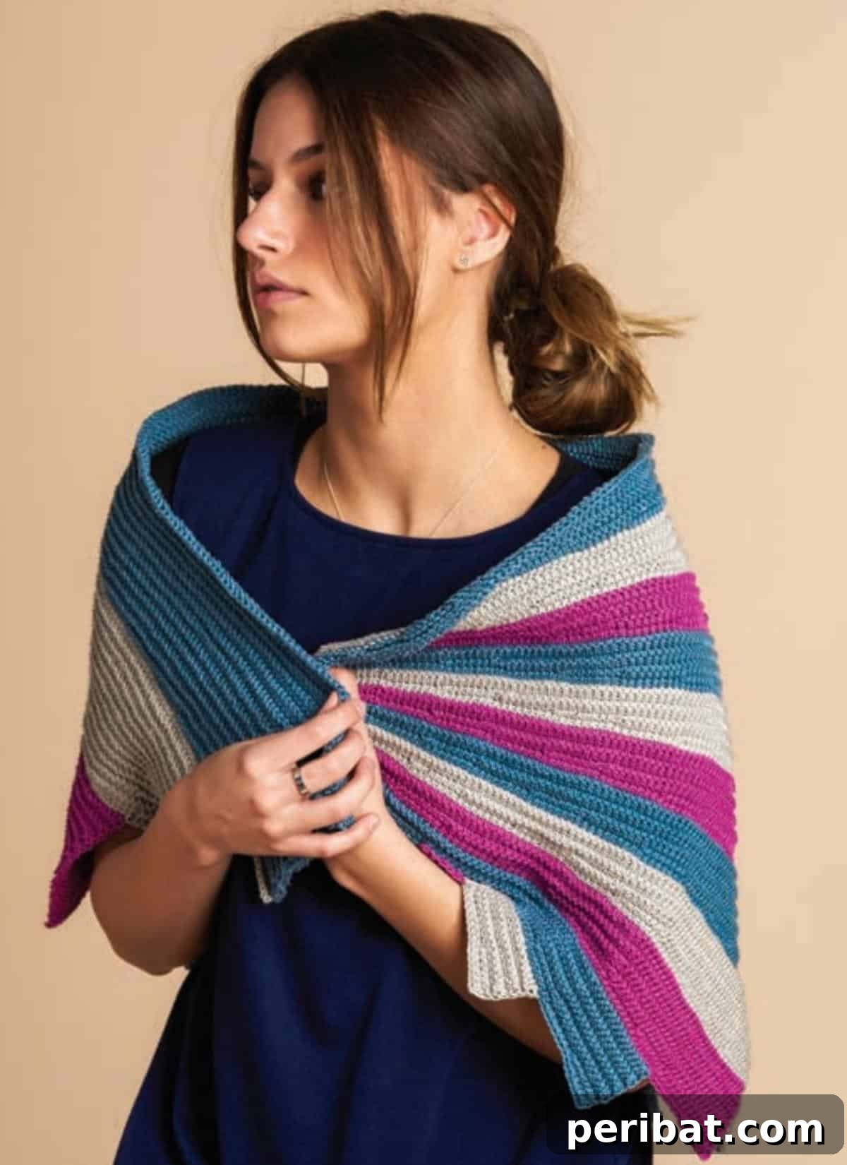 29 Beautiful Tunisian Crochet Projects 4 Patons Wrap It Up Tunisian Crochet Shawl, showcasing vibrant color contrasts in a cozy design.