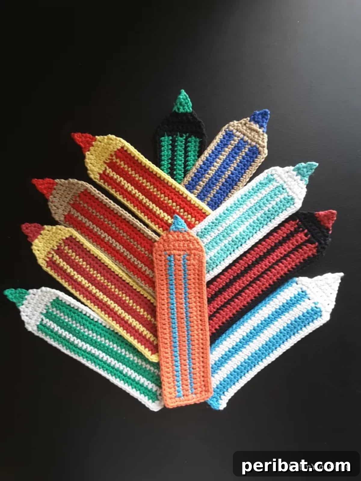 36 Free Crochet Bookmark Designs 11 A colorful Striped Pencil Crochet Bookmark peeking from an open book.