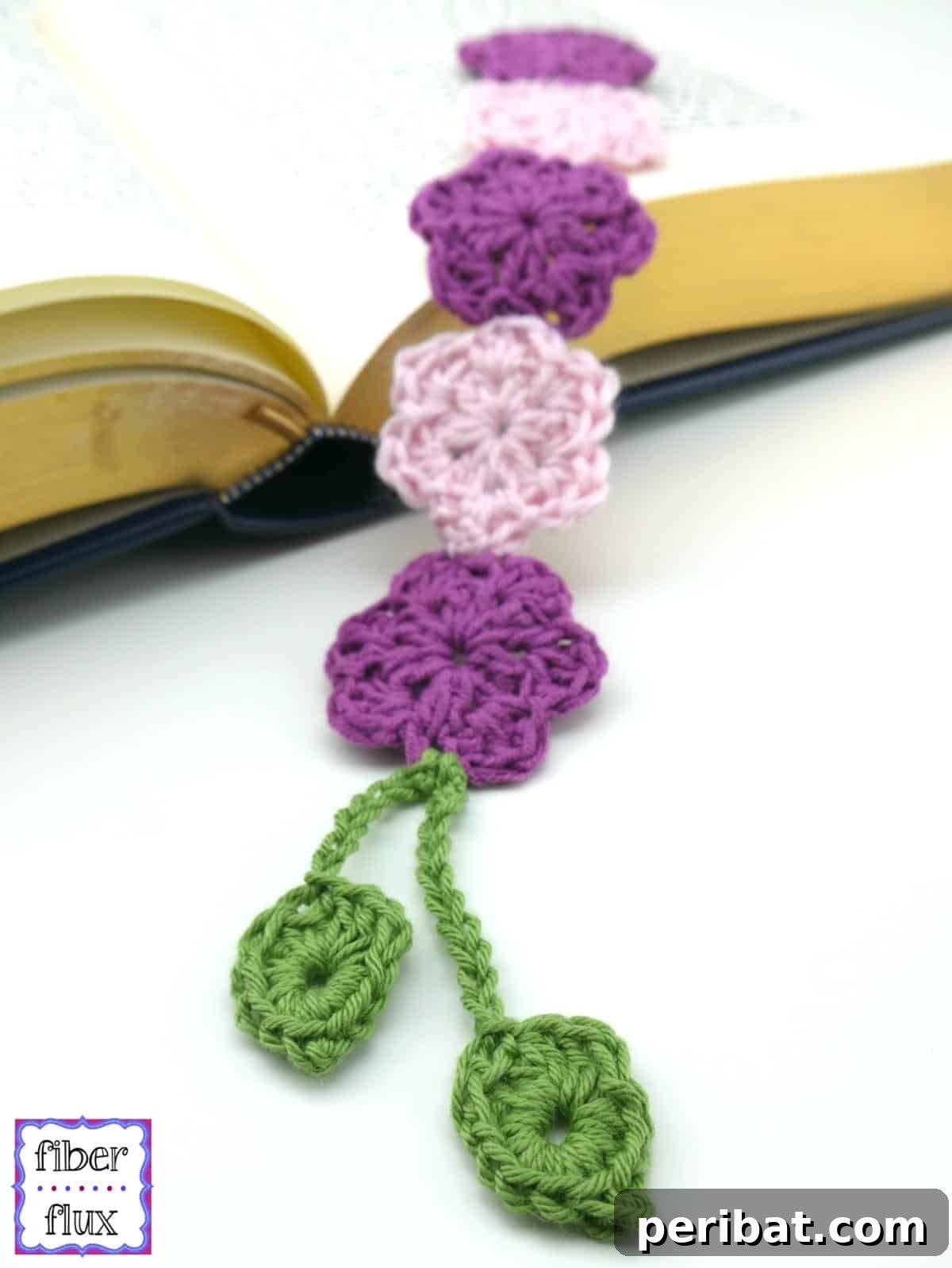 36 Free Crochet Bookmark Designs 12 A Botanical Crochet Bookmark with small blossoms and two hanging leaves.