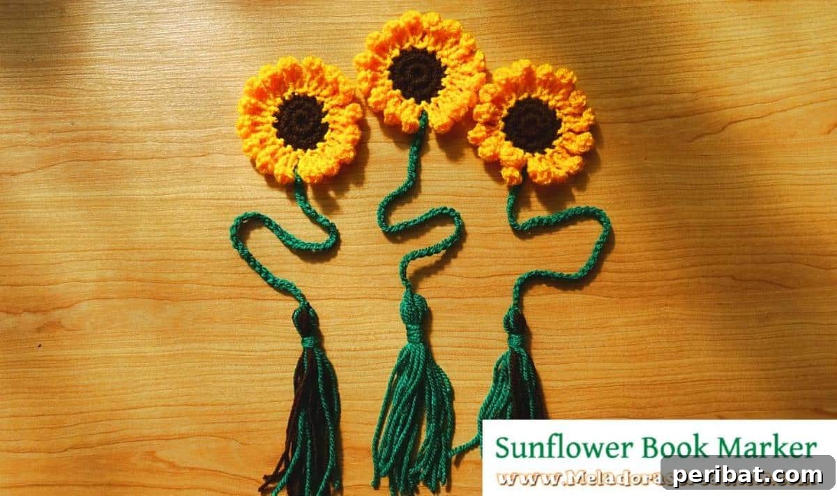 36 Free Crochet Bookmark Designs 14 A bright Sunflower Crochet Bookmark with a green stem and leaf, radiating cheer.