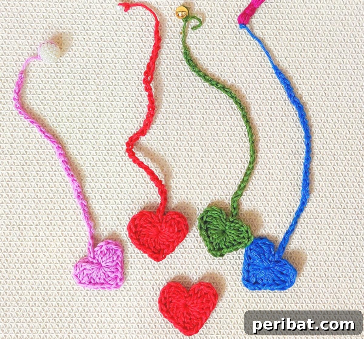 36 Free Crochet Bookmark Designs 19 Two Crochet Heart Bookmarks in red and pink, marking pages in a book.
